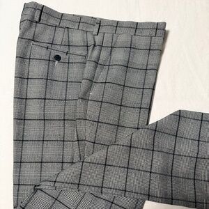 Gently worn and meticulously cared tailored plaid trousers